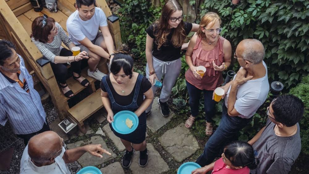 community backyard party with good neighbor