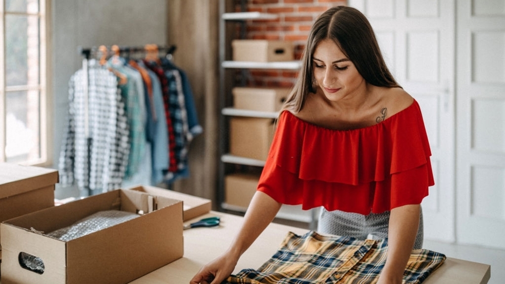 a woman is making ready her home for sell