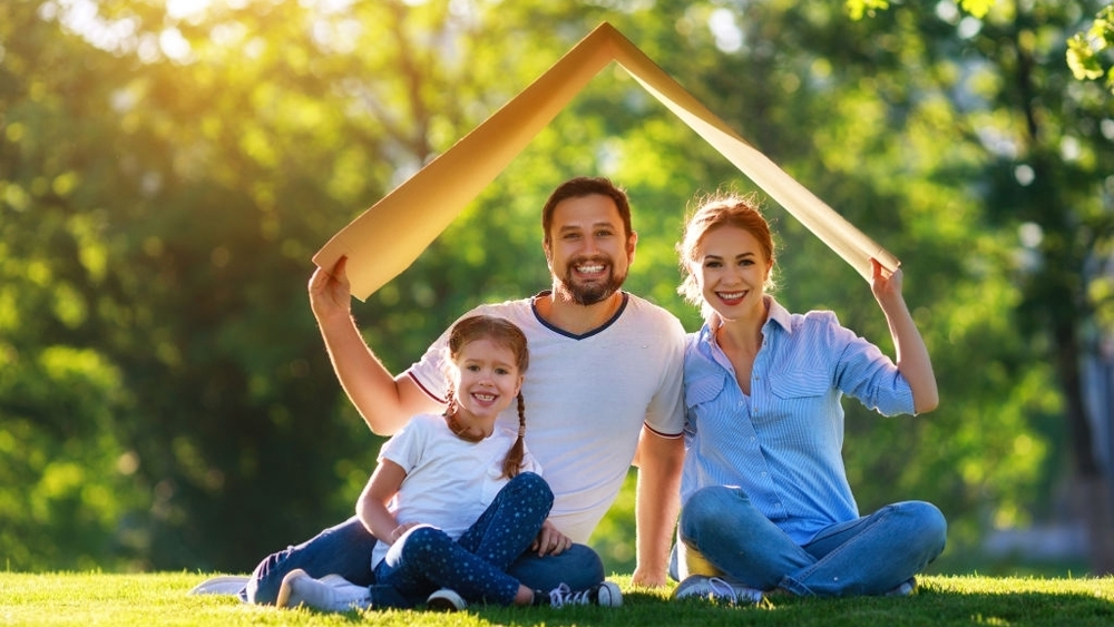 a roof above a families including mother, father and child