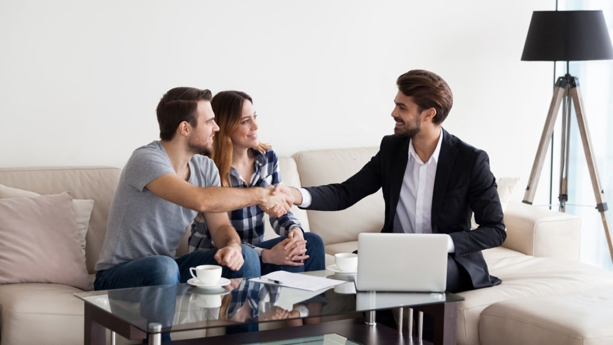 Family making deal with realtor