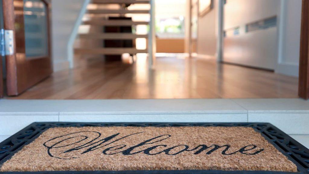 Close up of a welcome mat in an inviting house