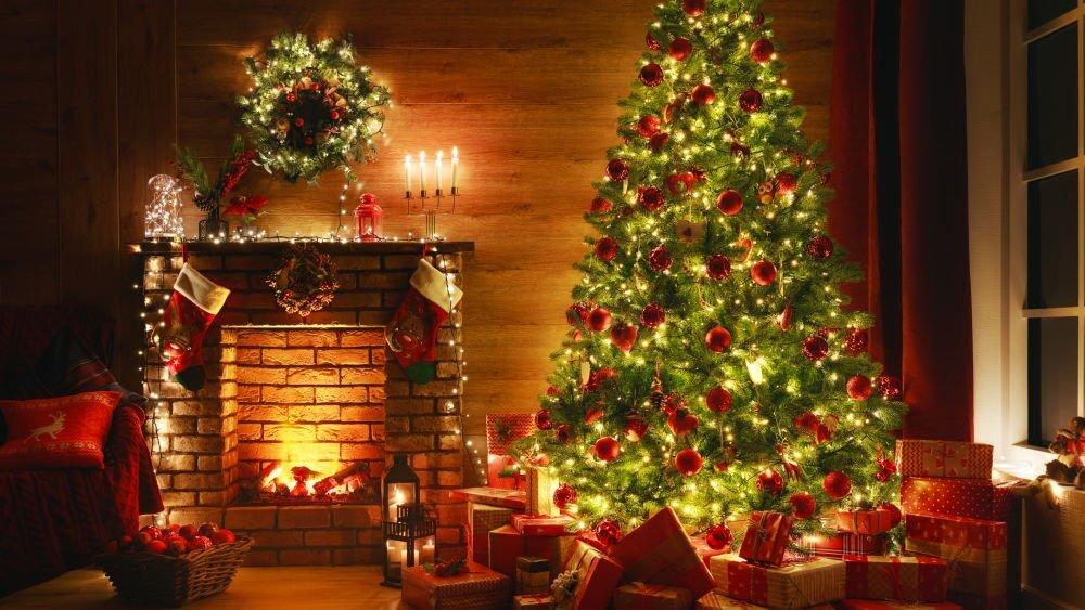 Interior Christmas magic glowing tree, fireplace and gifts