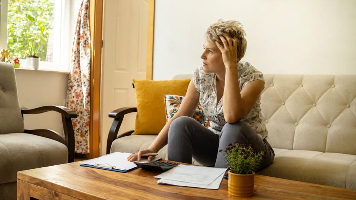 Distracted woman for mortgage affordability stress