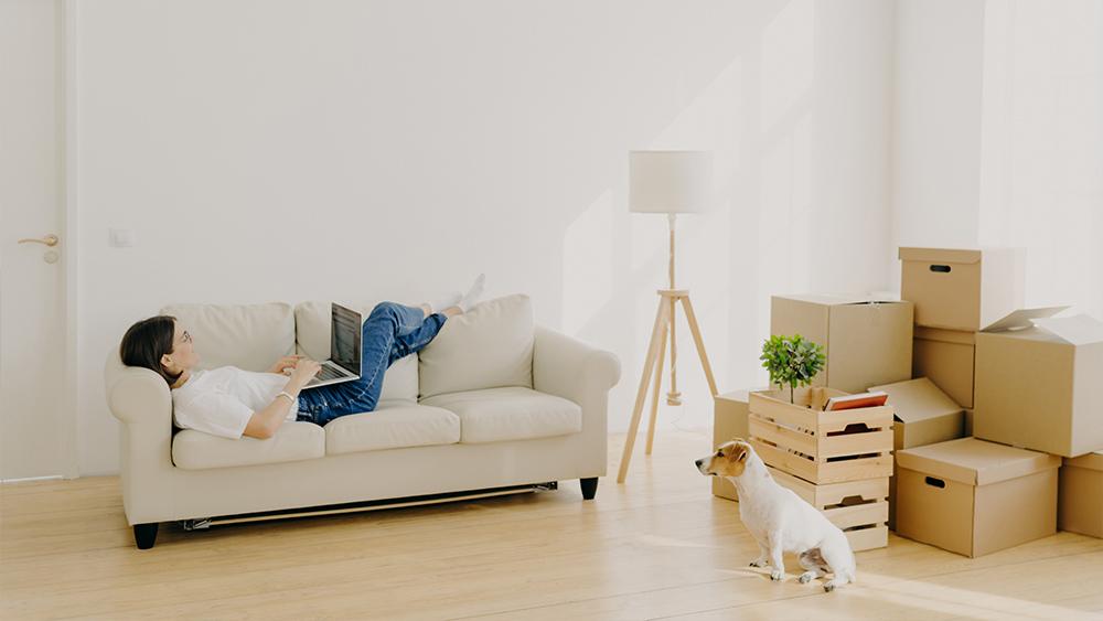 Woman taking rest after relocation to new home