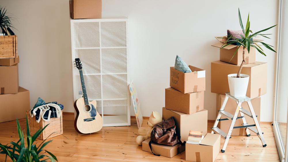 View of home with boxes on moving day