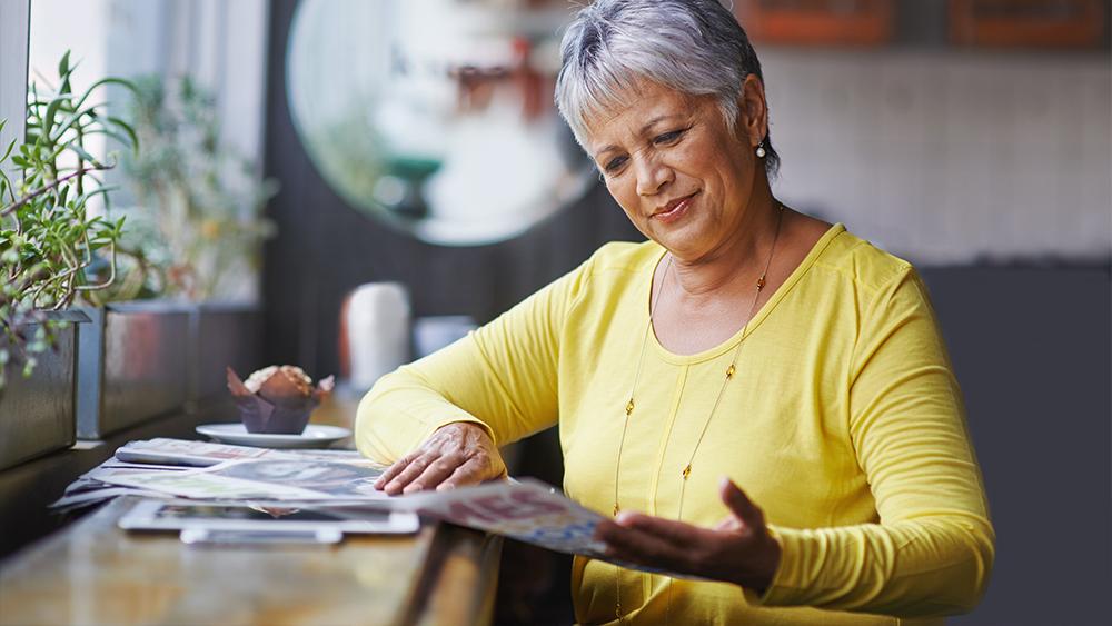 Old lady keeping up with local news