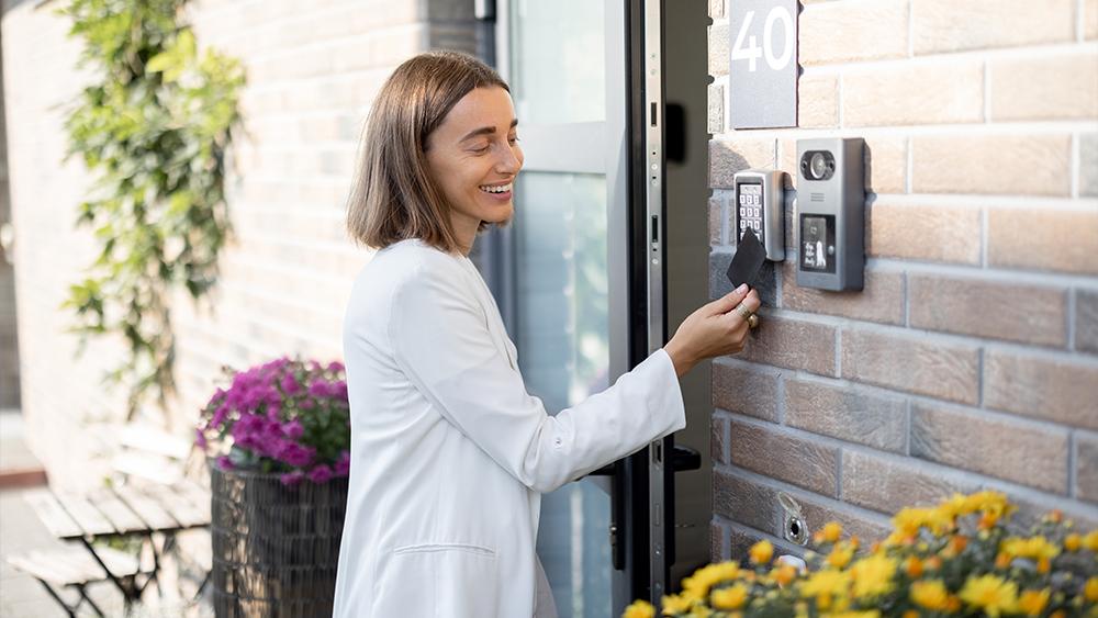 Woman gets access to enter home by a security card