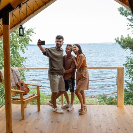 Happy family making selfie at a vacation home Happy family making selfie at a vacation home